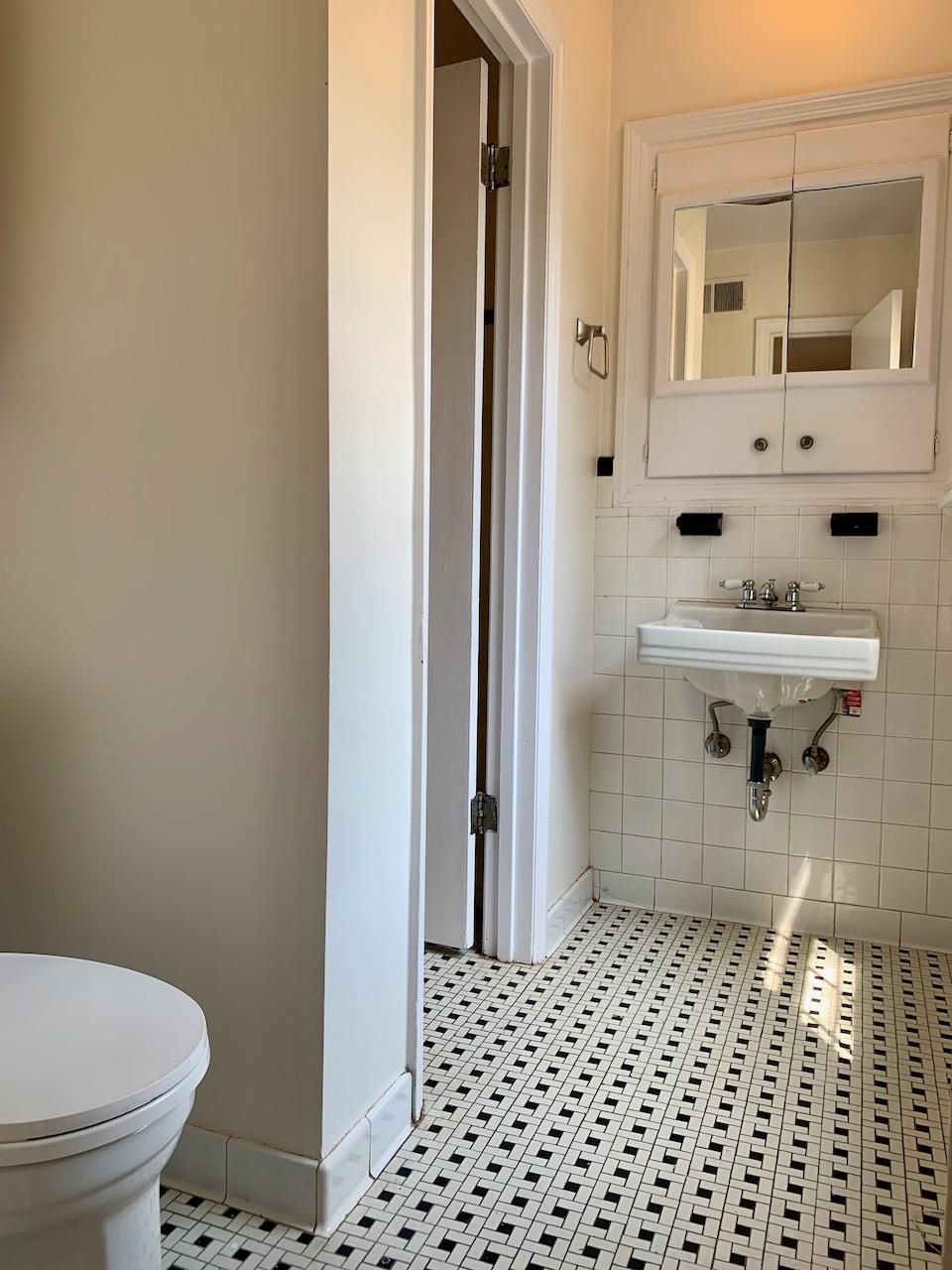1229 Wilmore Road Memphis, TN 38117 - Photo 12 of 20 a bathroom with a sink and a toilet