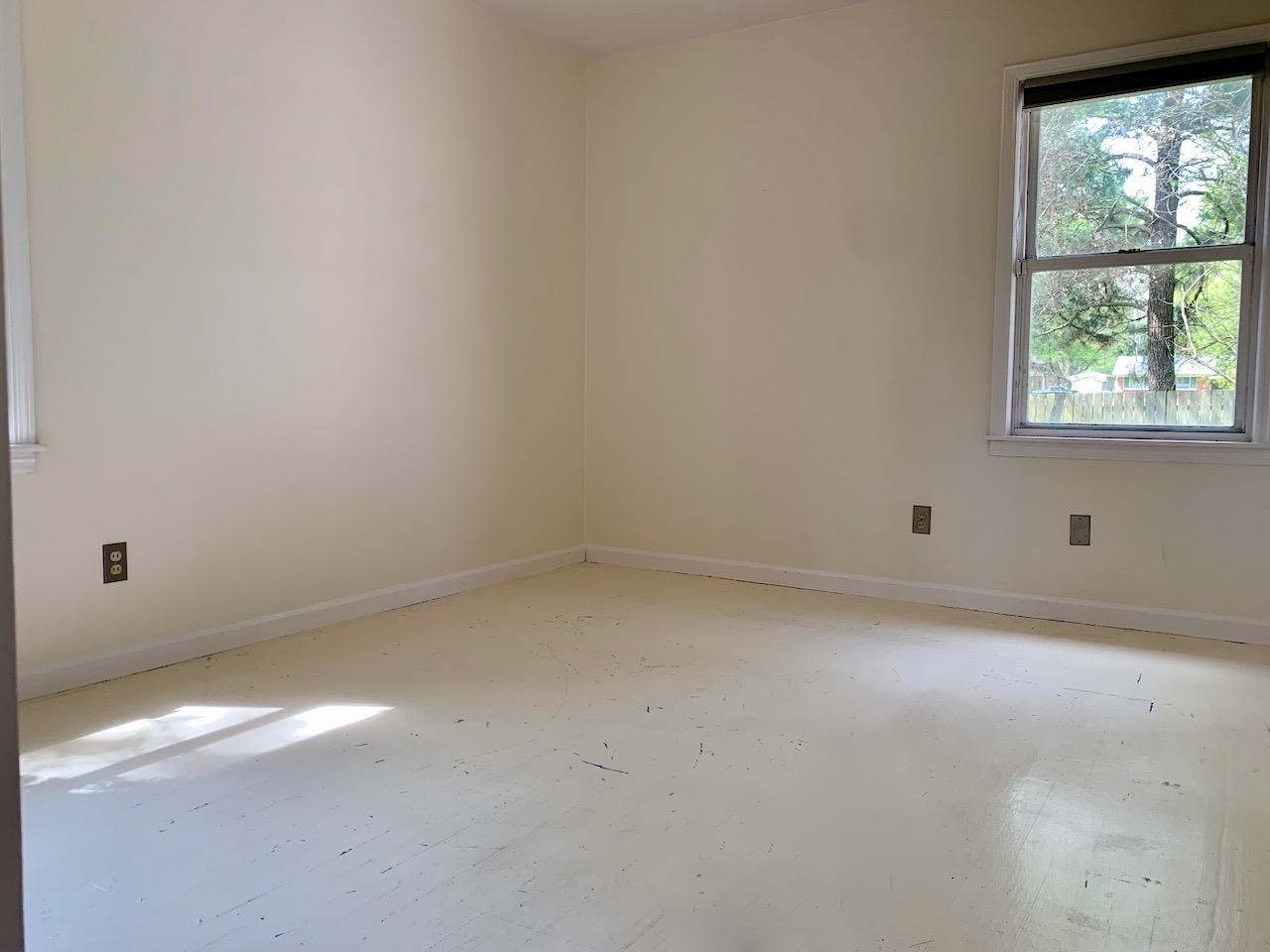 1229 Wilmore Road Memphis, TN 38117 - Photo 14 of 20 a view of an empty room with a window