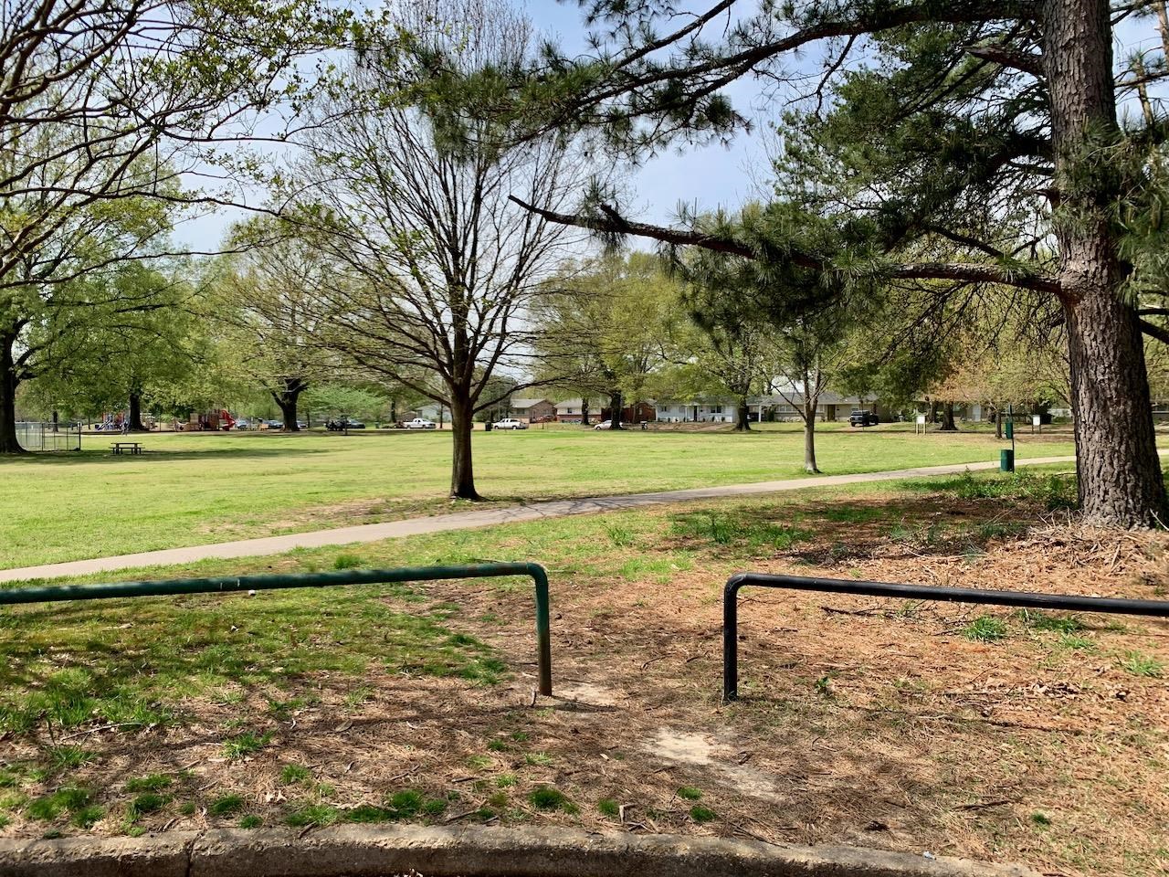 1229 Wilmore Road Memphis, TN 38117 - Photo 19 of 20 a view of a yard with a slide and trees