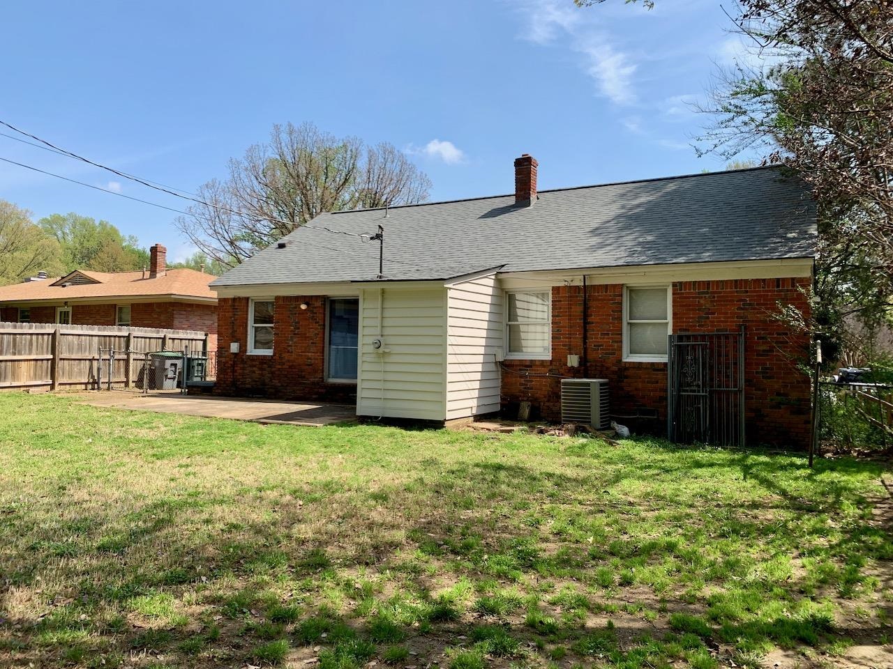 1229 Wilmore Road Memphis, TN 38117 - Photo 4 of 20 a view of a house with a yard