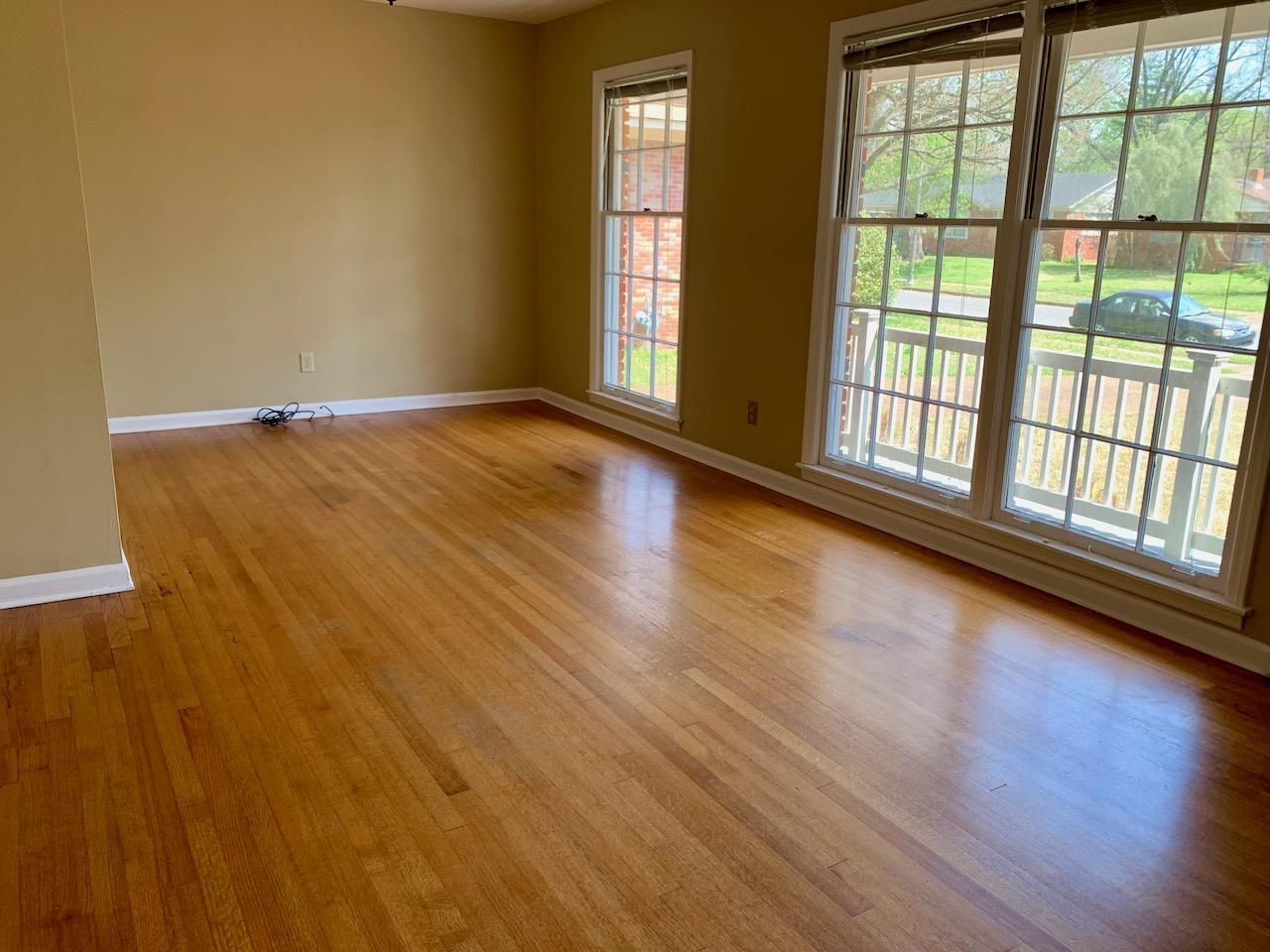 1229 Wilmore Road Memphis, TN 38117 - Photo 5 of 20 wooden floor in an empty room with a window