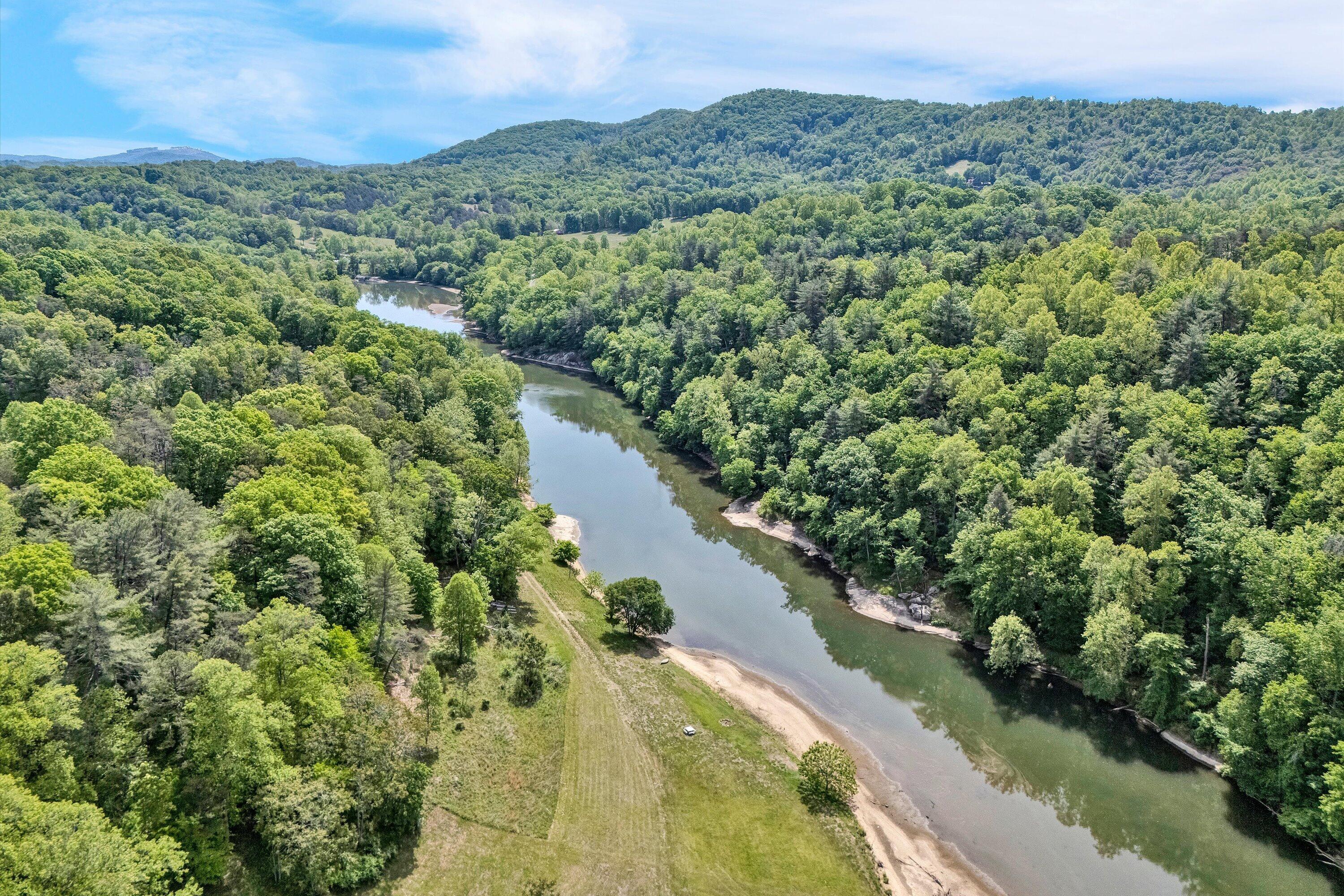 Lot 26 River Rock Road Vinton, VA 24179 - Photo 13 of 28 a view of a lake with a mountain in the background