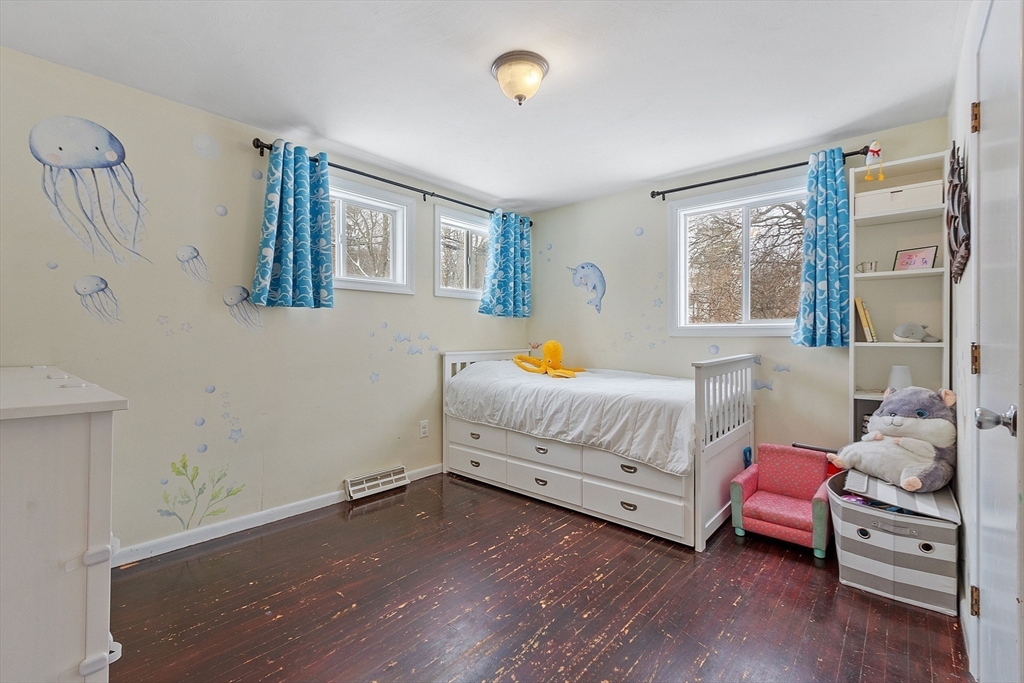 2 Edith Road Hudson, MA 01749 - Photo 13 of 23 a bedroom with a bed and wooden floor