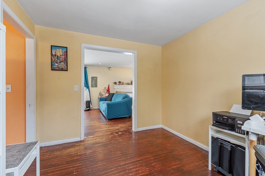 2 Edith Road Hudson, MA 01749 - Photo 14 of 23 a view of a room that has a bed and wooden floor