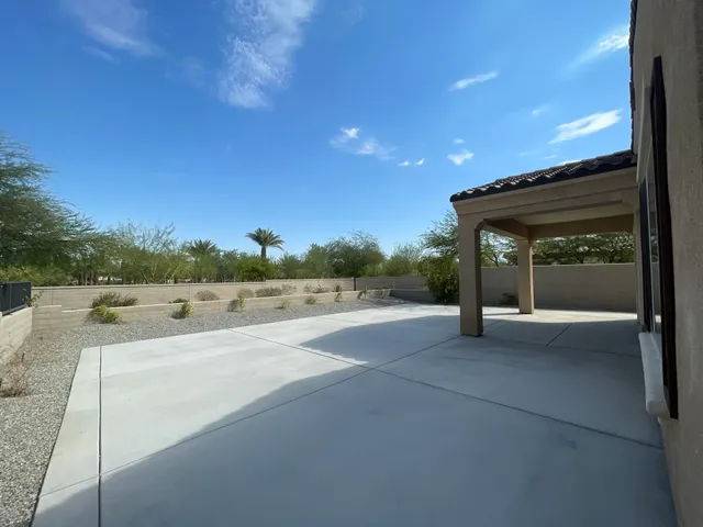 a view of a terrace with yard and outdoor space