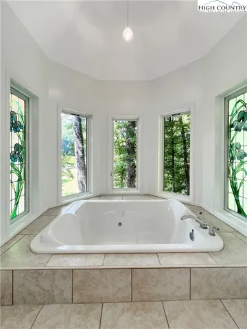 a kitchen with a stove a sink and a refrigerator