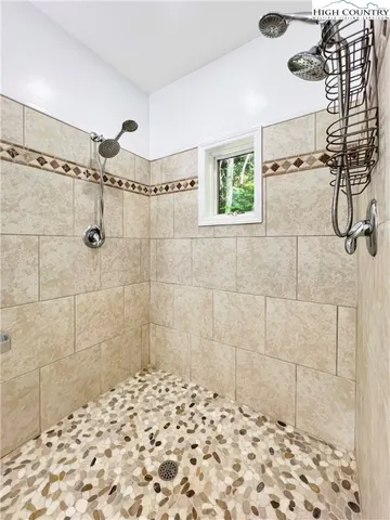 a utility room with sink dryer and washer