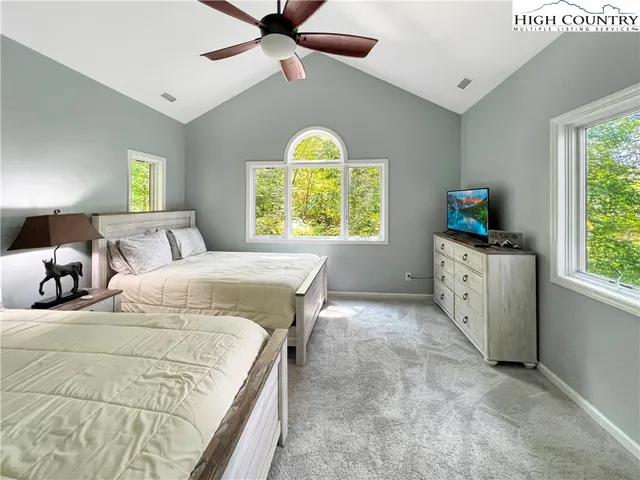 a bathroom with a tub sink and toilet