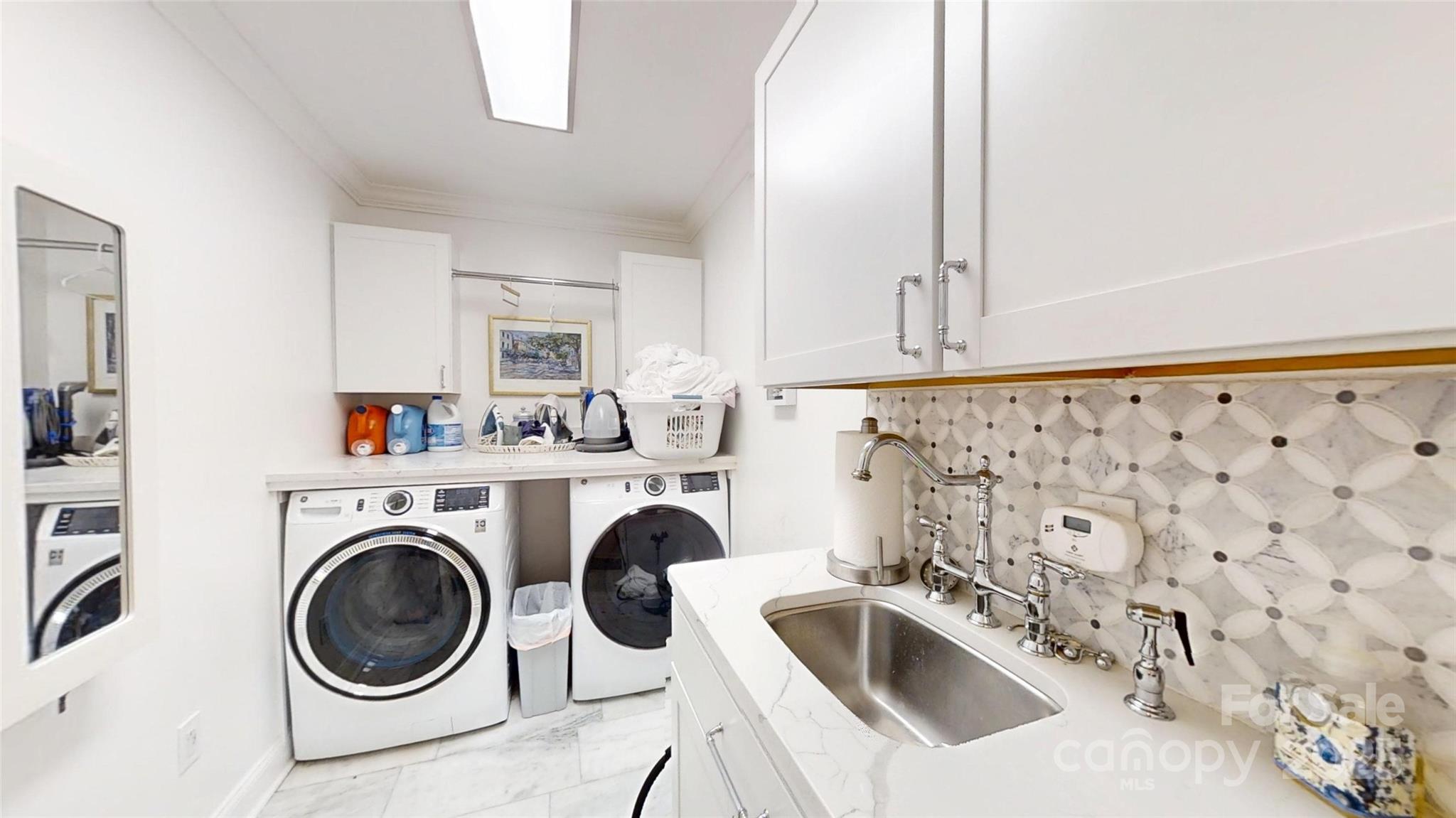 5298 Hoover Elmore Road Vale, NC 28168 - Photo 18 of 29 a utility room with sink dryer and washer
