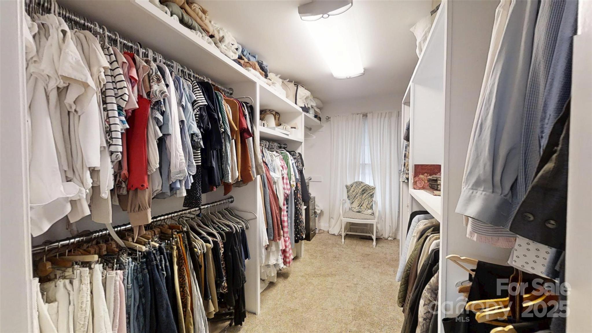 5298 Hoover Elmore Road Vale, NC 28168 - Photo 20 of 29 a view of walk in closet with clothes