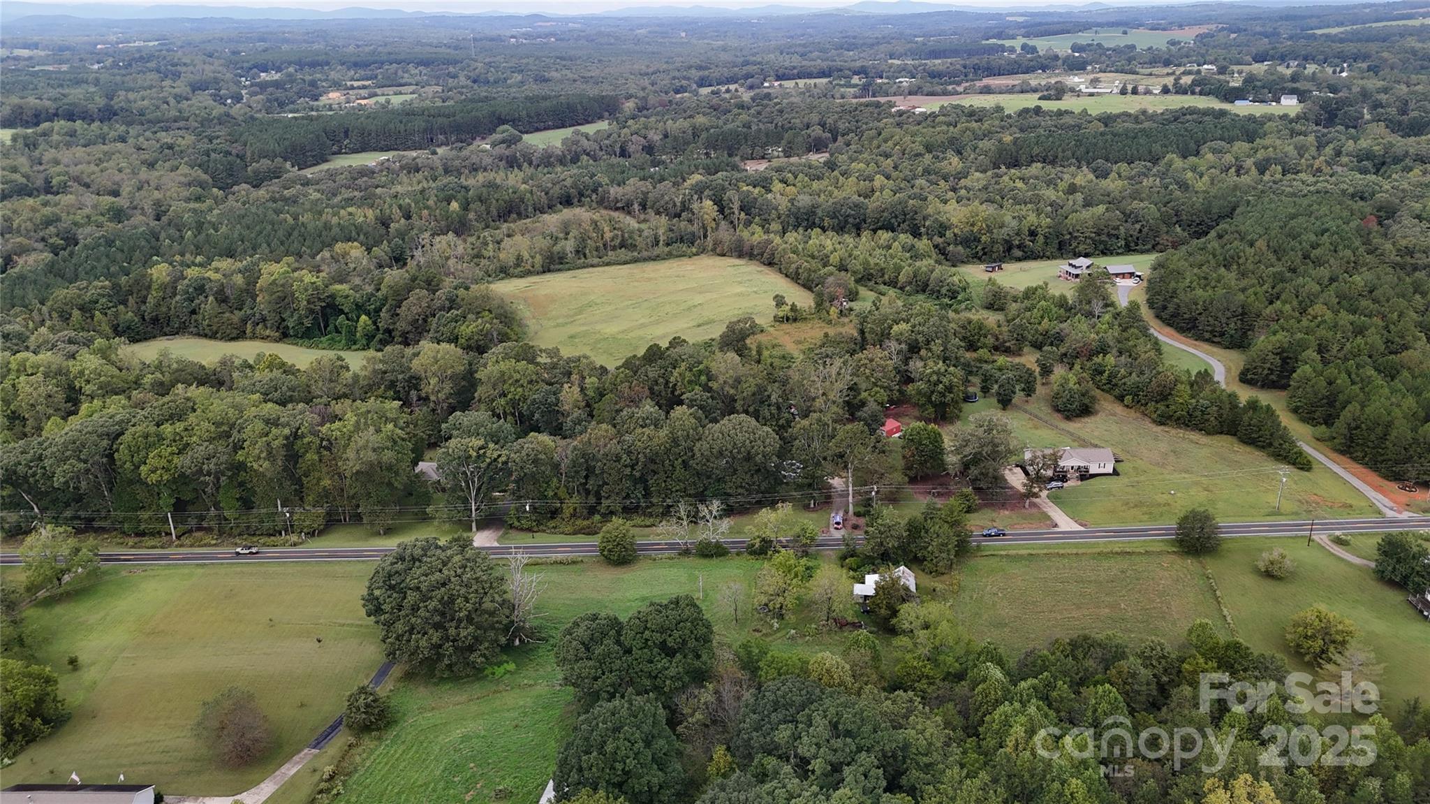 5298 Hoover Elmore Road Vale, NC 28168 - Photo 23 of 29 an aerial view of residential houses with outdoor space and trees