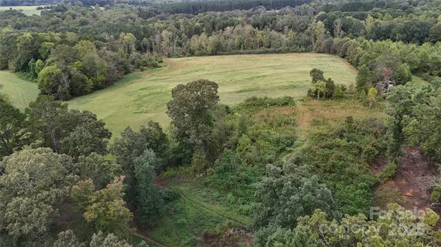 a view of a back yard of the house