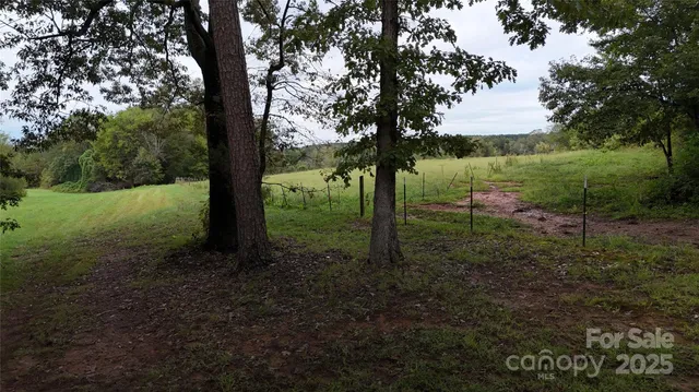 a kitchen with lots of counter space and dining table