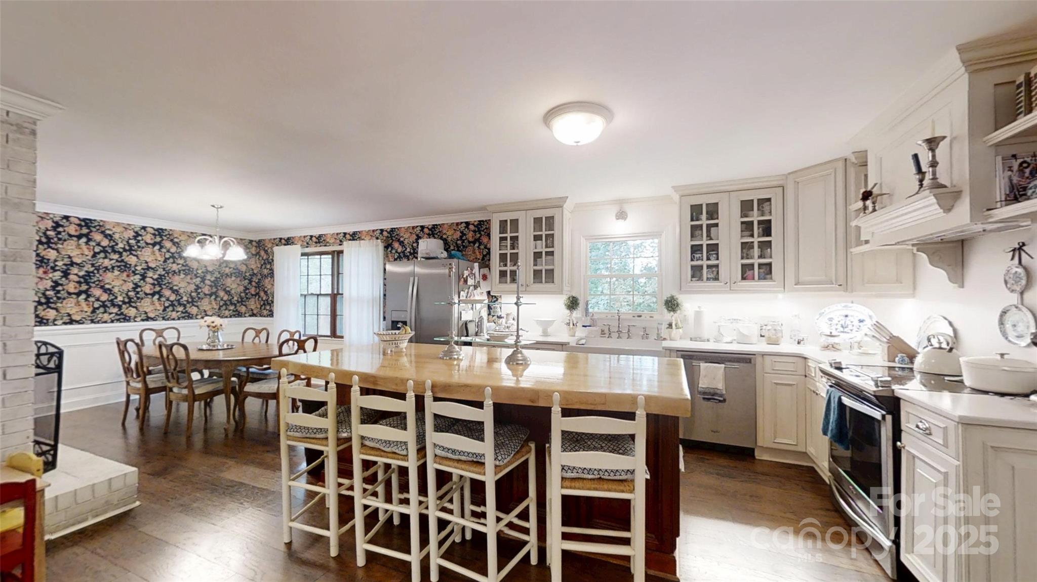 5298 Hoover Elmore Road Vale, NC 28168 - Photo 7 of 29 a kitchen with lots of counter space and dining table