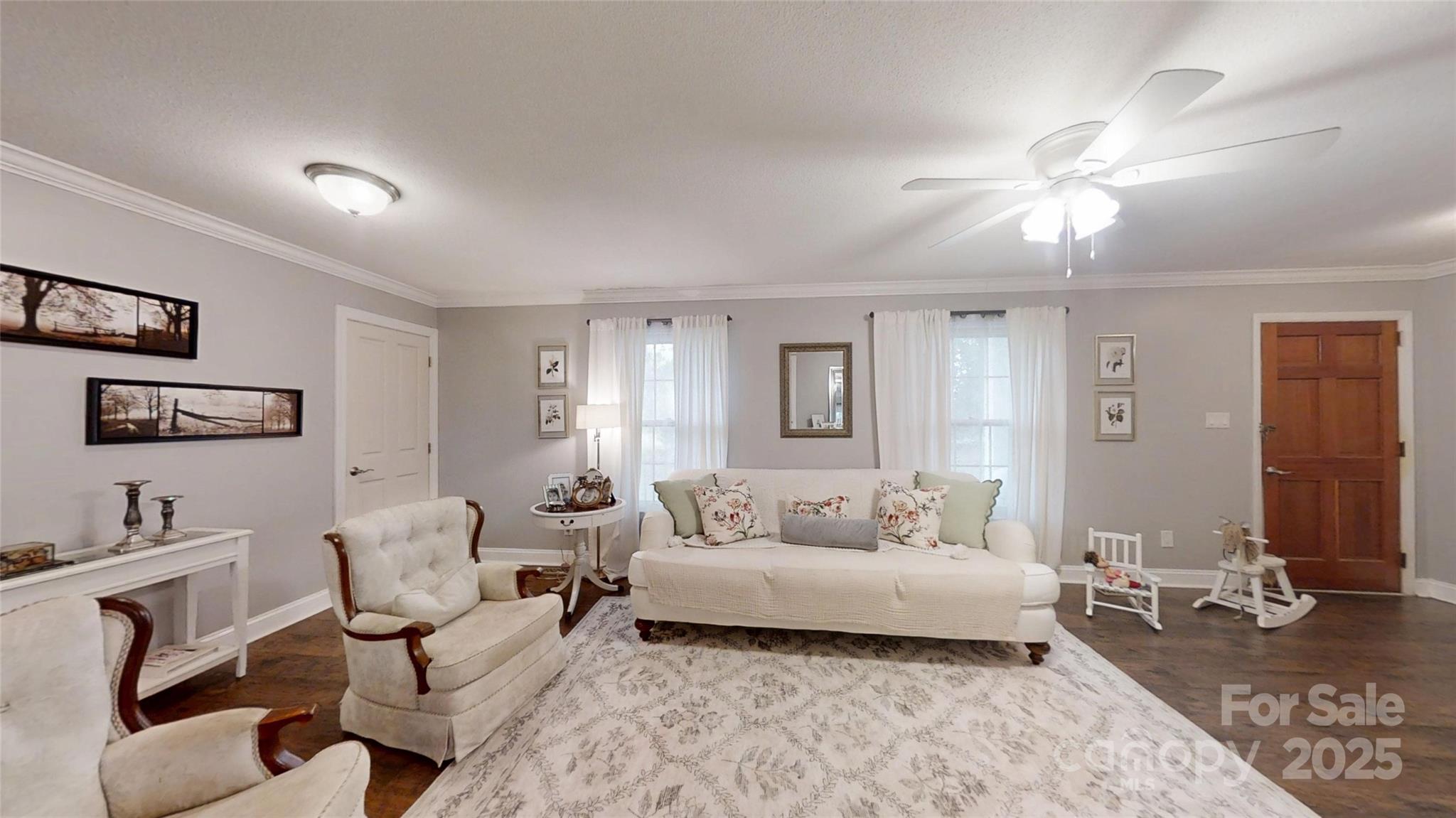 5298 Hoover Elmore Road Vale, NC 28168 - Photo 10 of 29 a spacious bedroom with a bed a couch and dresser