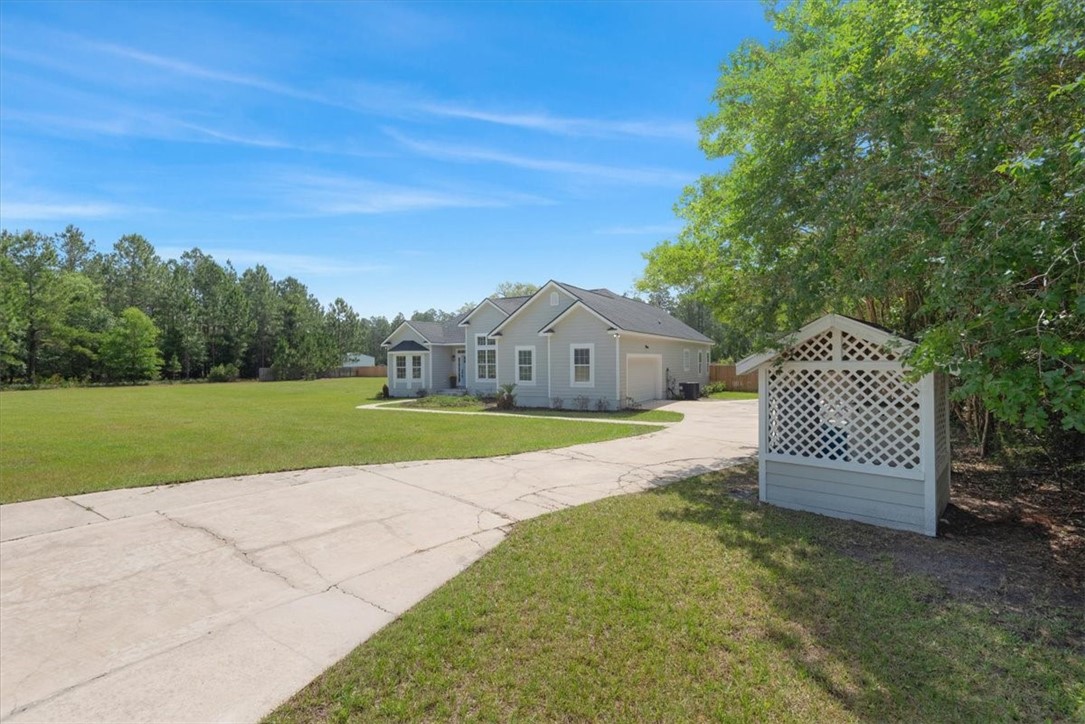 2657 Horseshoe Cove Road Waverly, GA 31565 - Photo 4 of 55 Front Right Side View
