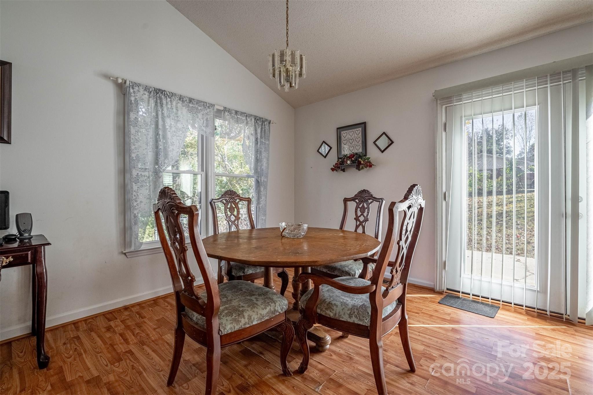 2693 Farmland Acrs Road Morganton, NC 28655 - Photo 18 of 33 a view of a dining room with furniture window and wooden floor