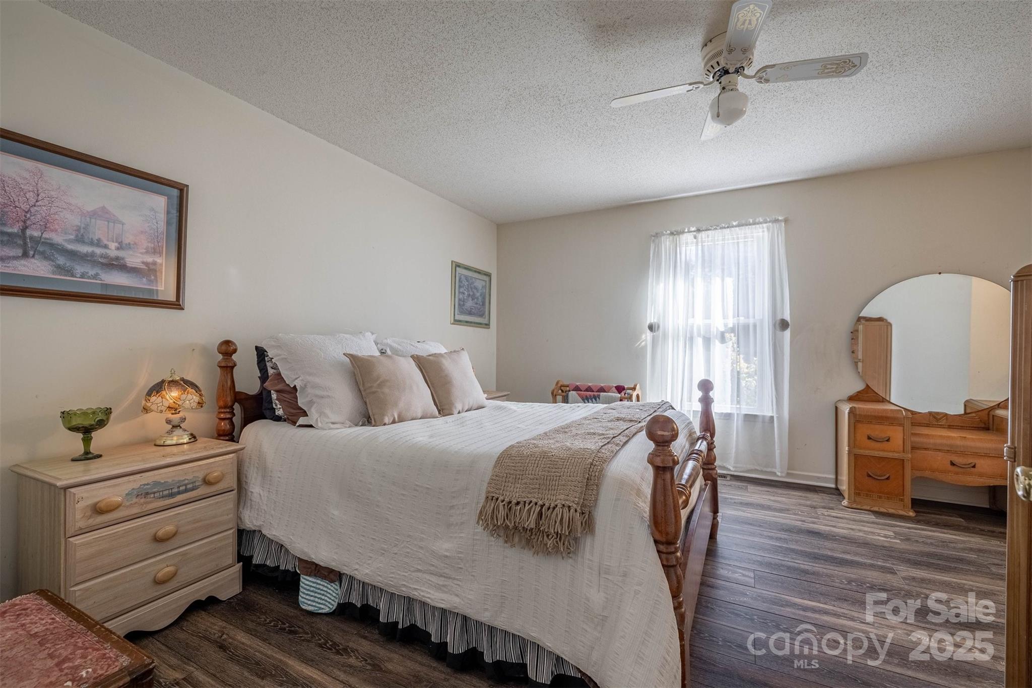 2693 Farmland Acrs Road Morganton, NC 28655 - Photo 22 of 33 a bedroom with a bed and wooden floor