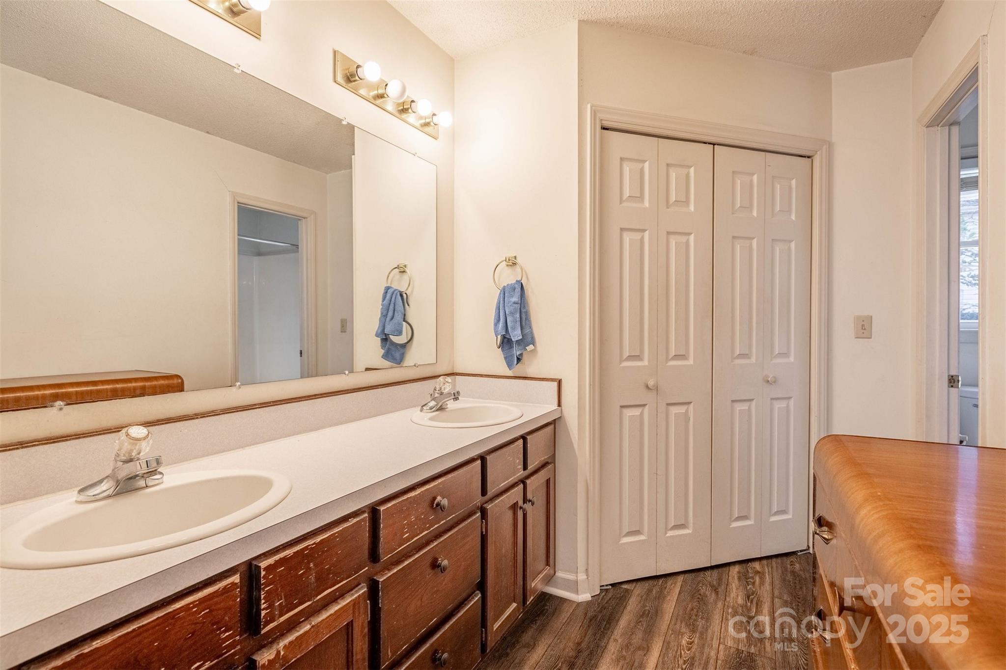 2693 Farmland Acrs Road Morganton, NC 28655 - Photo 24 of 33 a bathroom with a sink and a mirror