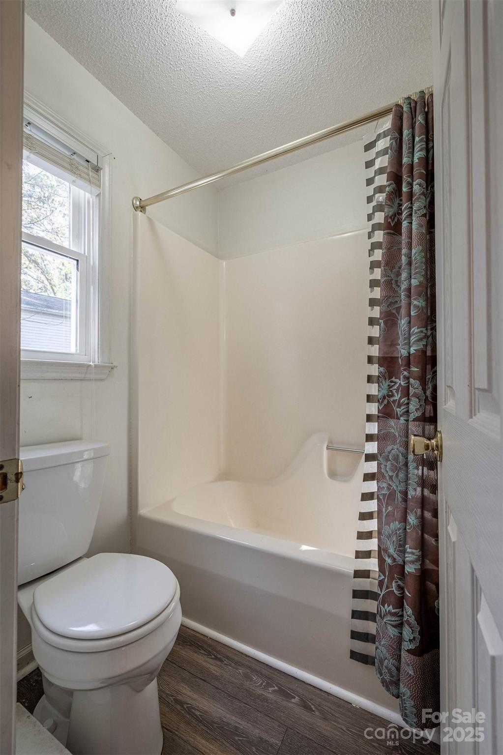 2693 Farmland Acrs Road Morganton, NC 28655 - Photo 25 of 33 a bathroom with a toilet and a bathtub