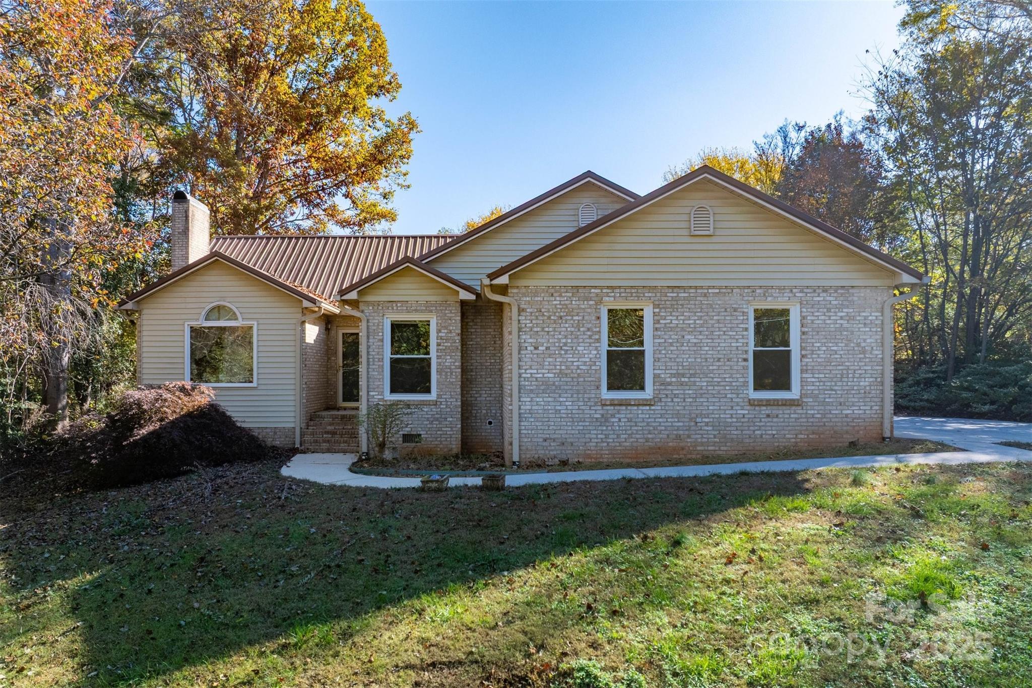2693 Farmland Acrs Road Morganton, NC 28655 - Photo 3 of 33 a view of a house with backyard and garden
