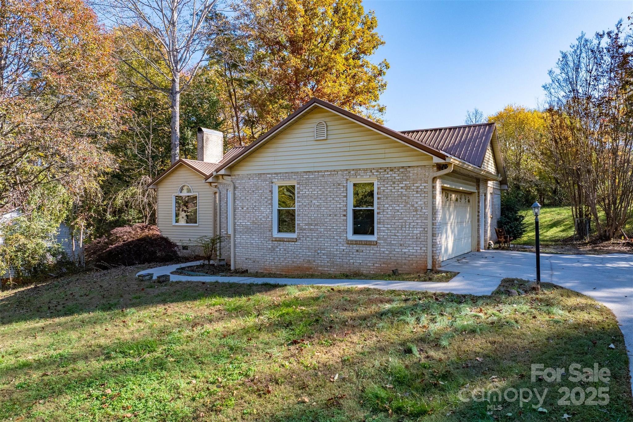 2693 Farmland Acrs Road Morganton, NC 28655 - Photo 4 of 33 a view of a house with a yard