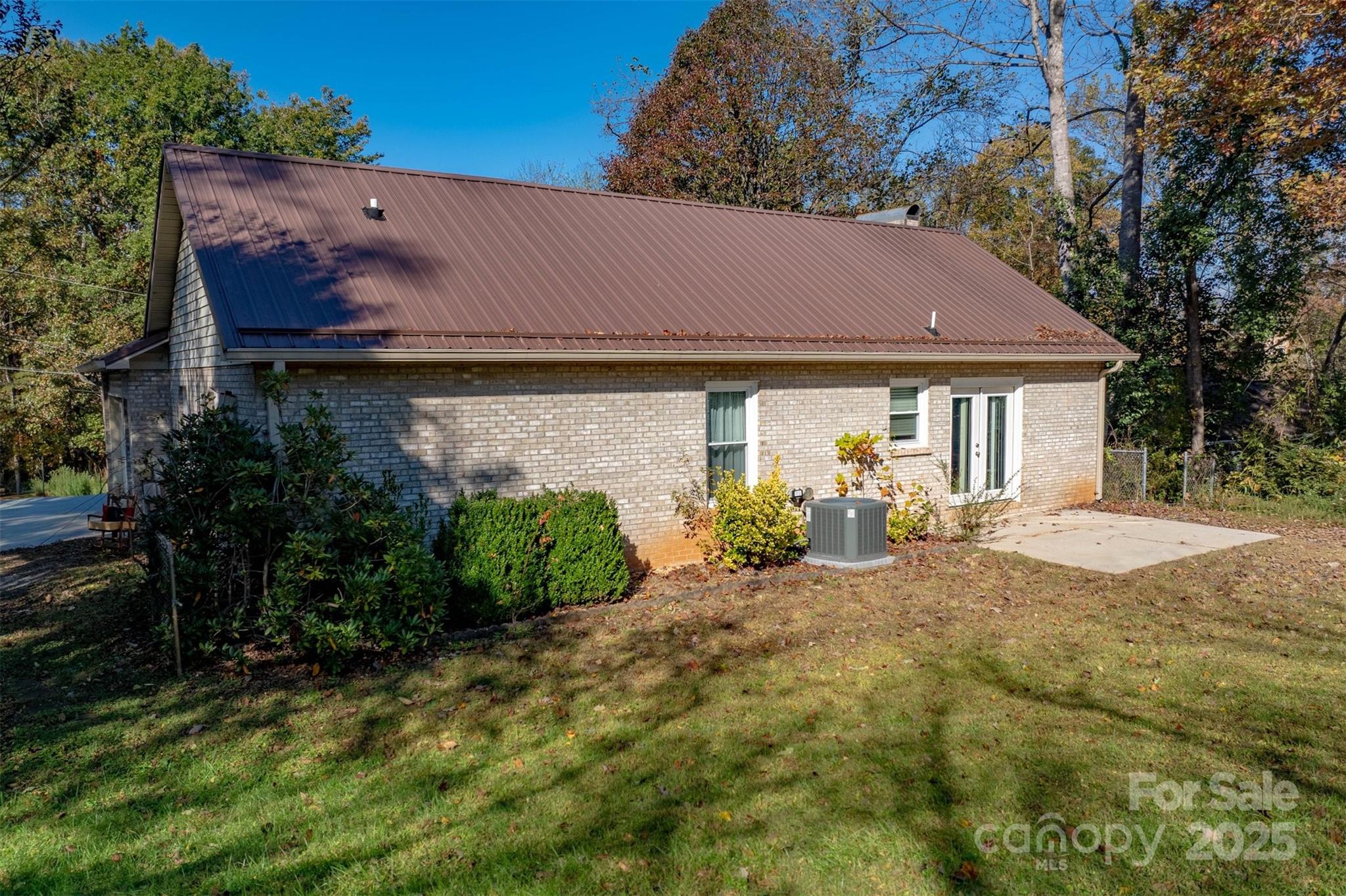 2693 Farmland Acrs Road Morganton, NC 28655 - Photo 5 of 33 a view of a house with backyard and sitting area