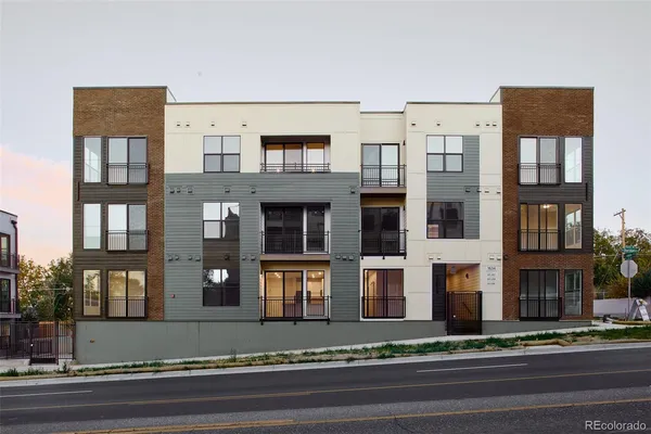 a view of a building along the street