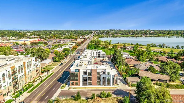 a view of a city with a lake