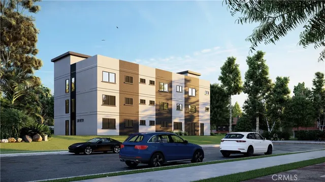 a couple of cars parked in front of a building