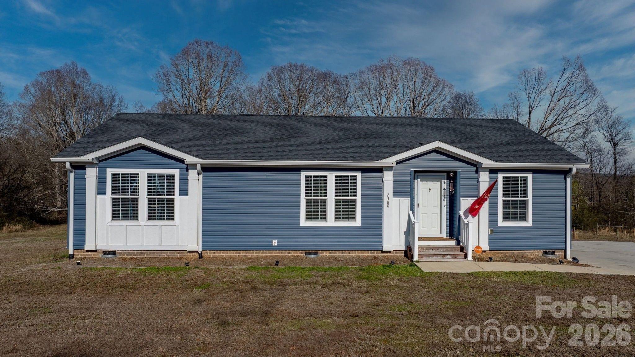 2388 Cat Square Road Vale, NC 28168 - Photo 1 of 24 a front view of a house with a yard