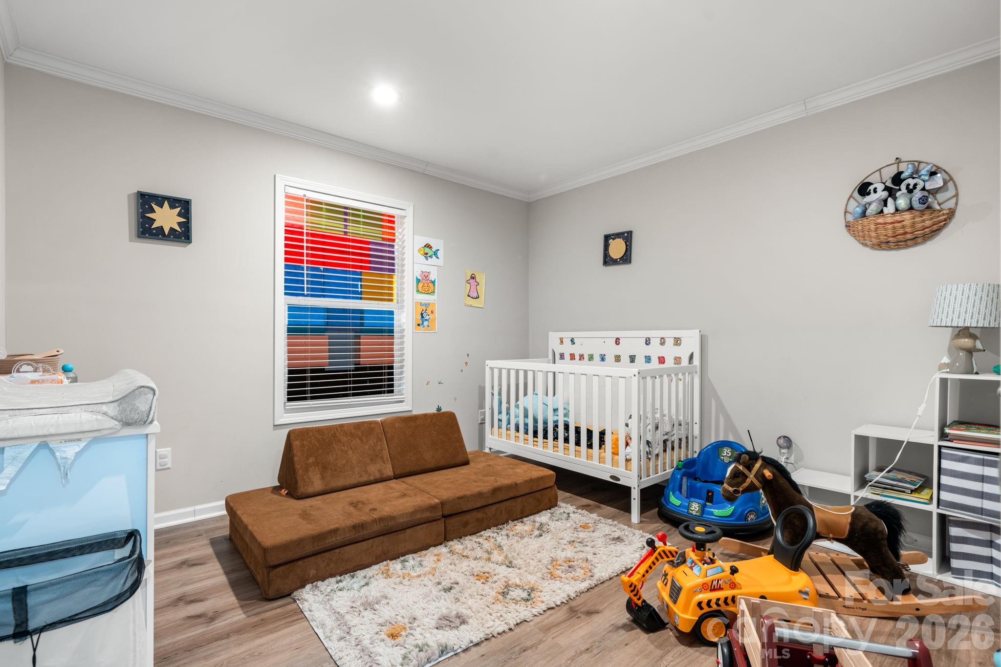 2388 Cat Square Road Vale, NC 28168 - Photo 14 of 24 a bedroom with furniture and a book shelf
