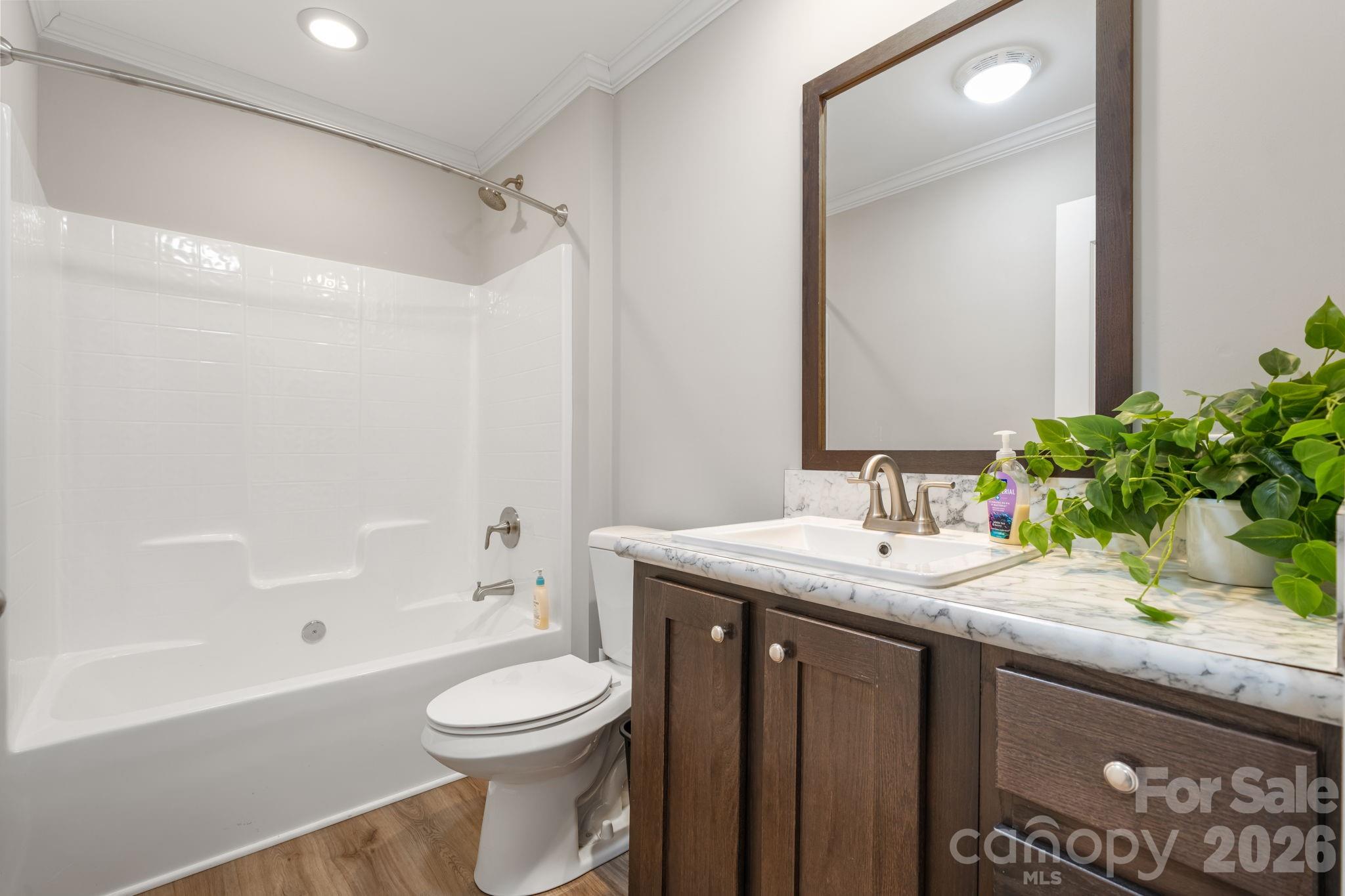 2388 Cat Square Road Vale, NC 28168 - Photo 15 of 24 a bathroom with a granite countertop sink toilet and shower