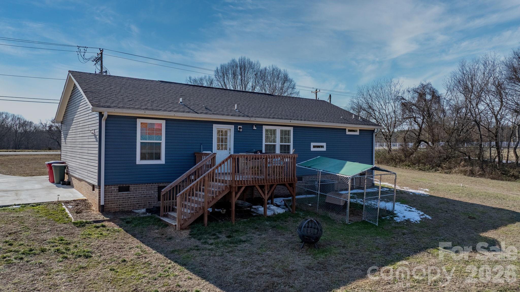 2388 Cat Square Road Vale, NC 28168 - Photo 17 of 24 a backyard of a house with seating space