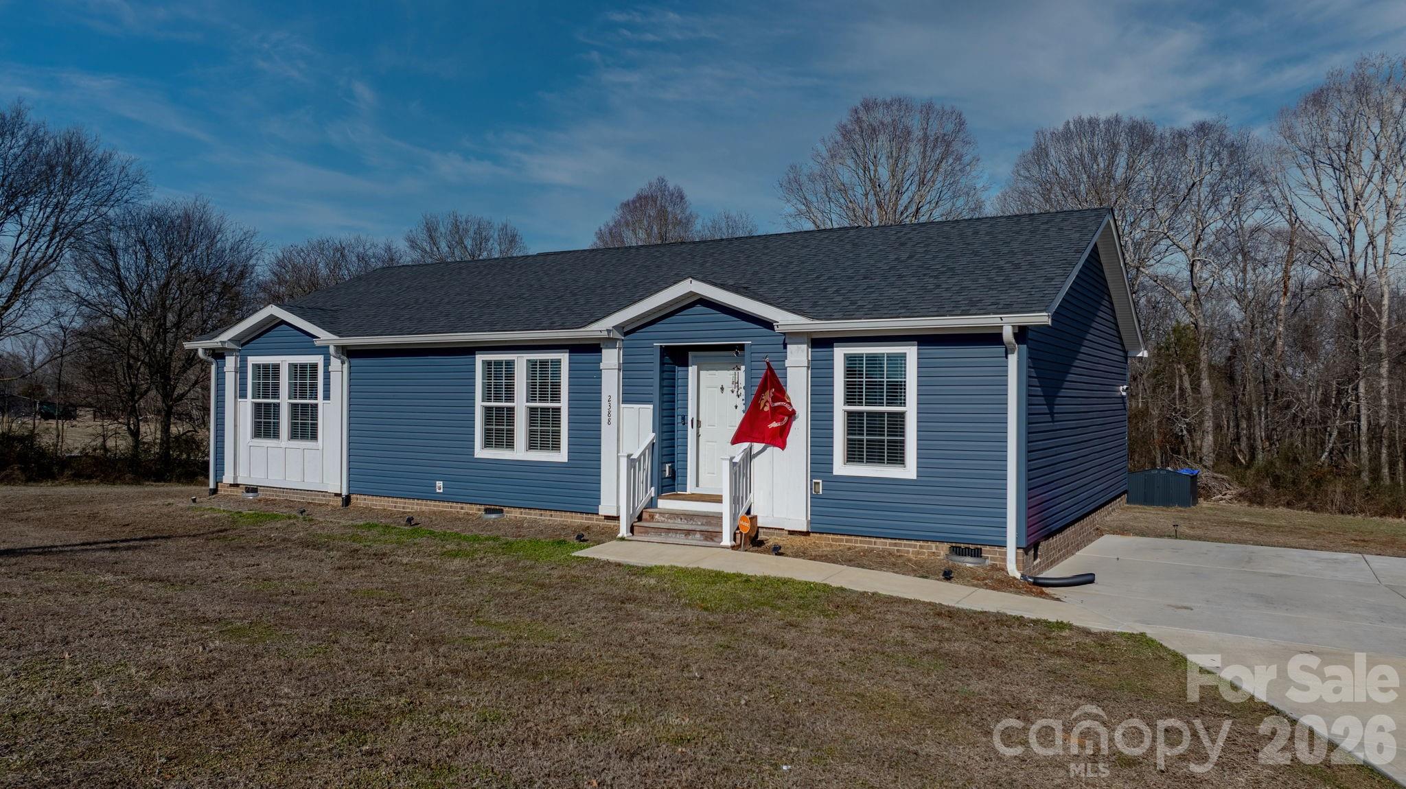 2388 Cat Square Road Vale, NC 28168 - Photo 2 of 24 a front view of a house with a yard
