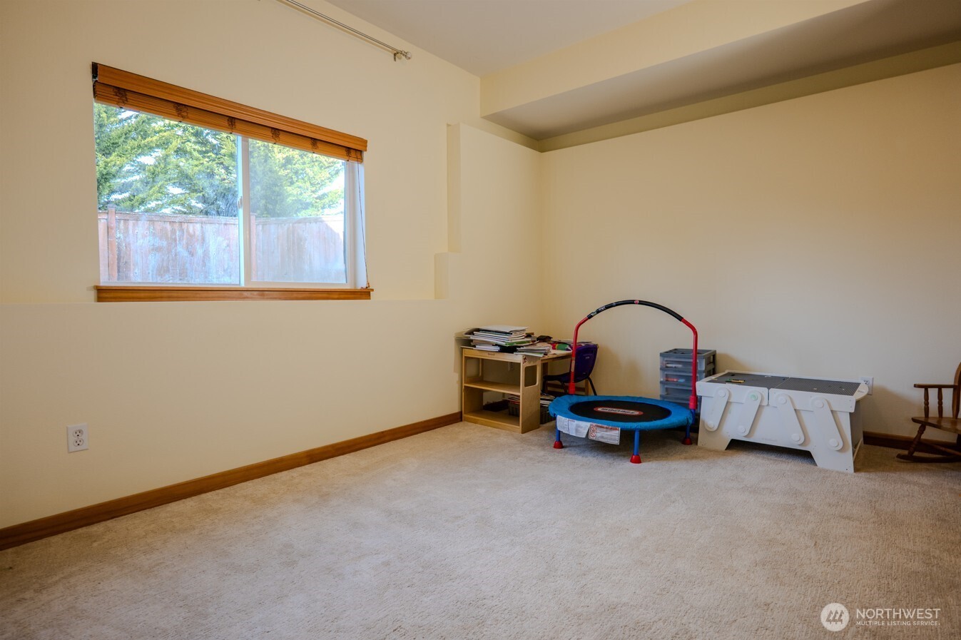 9723 Phillips Road Southeast Port Orchard, WA 98367 - Photo 27 of 37 a living room with furniture and a window