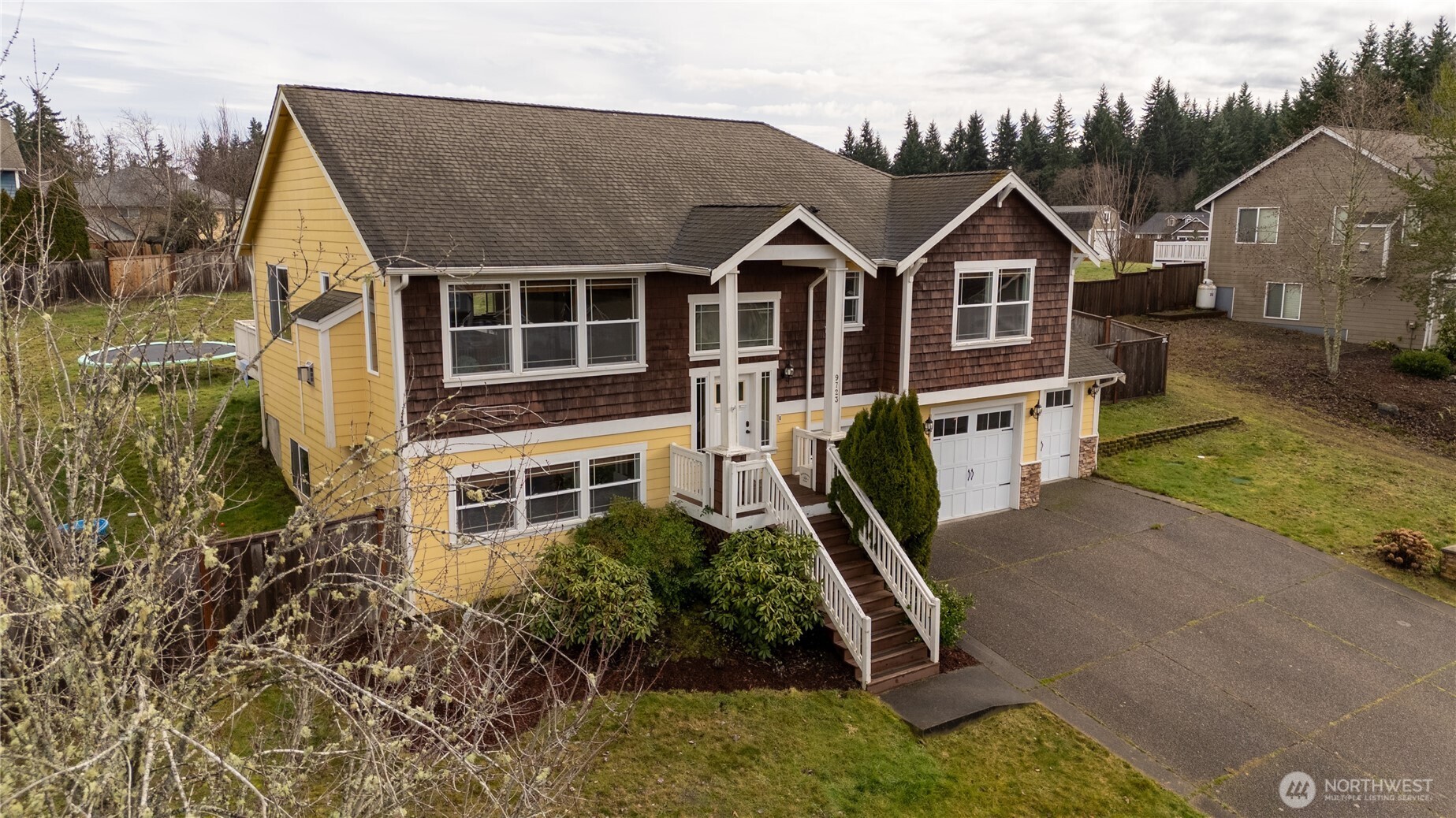 9723 Phillips Road Southeast Port Orchard, WA 98367 - Photo 37 of 37 a front view of a house with a yard