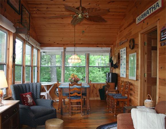 35 Fountain Road Wales, MA 01081 - Photo 7 of 26 a living room with furniture and floor to ceiling windows
