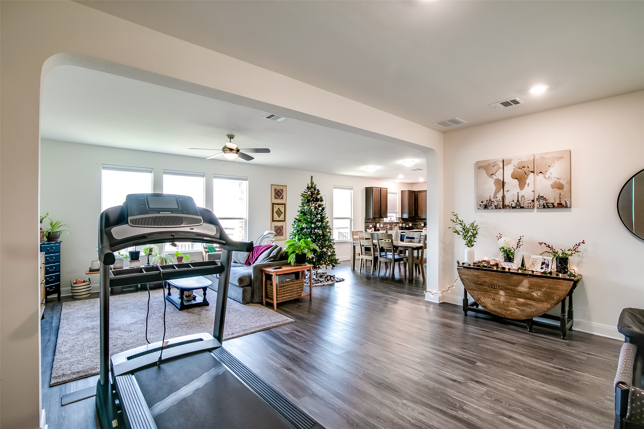 7616 Groundhog Way Austin, TX 78744 - Photo 10 of 34 a living room with furniture and wooden floor