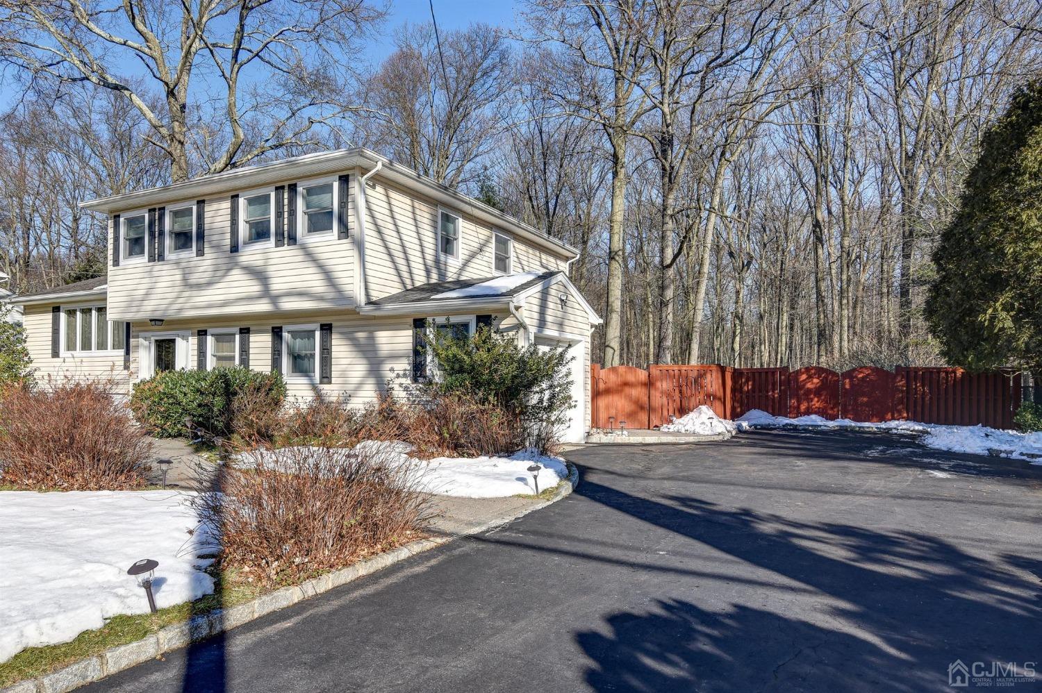 12 Warwick Road Edison, NJ 08820 - Photo 3 of 40 a front view of a house with a yard