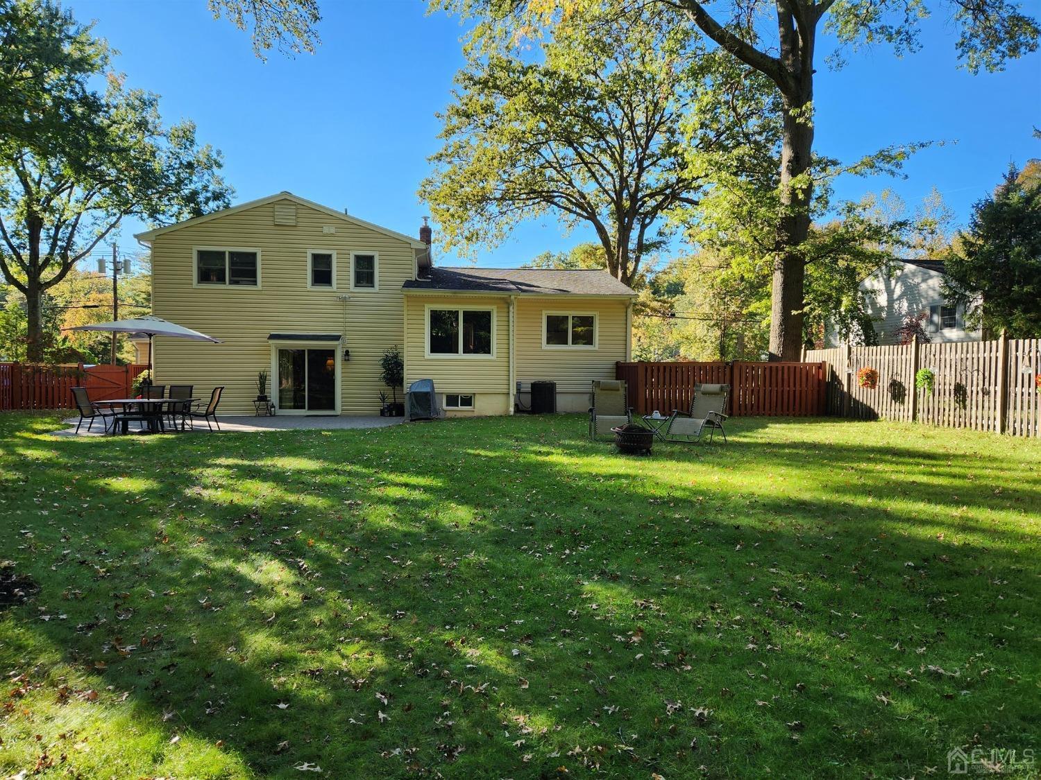 12 Warwick Road Edison, NJ 08820 - Photo 33 of 40 a front view of house with yard and green space