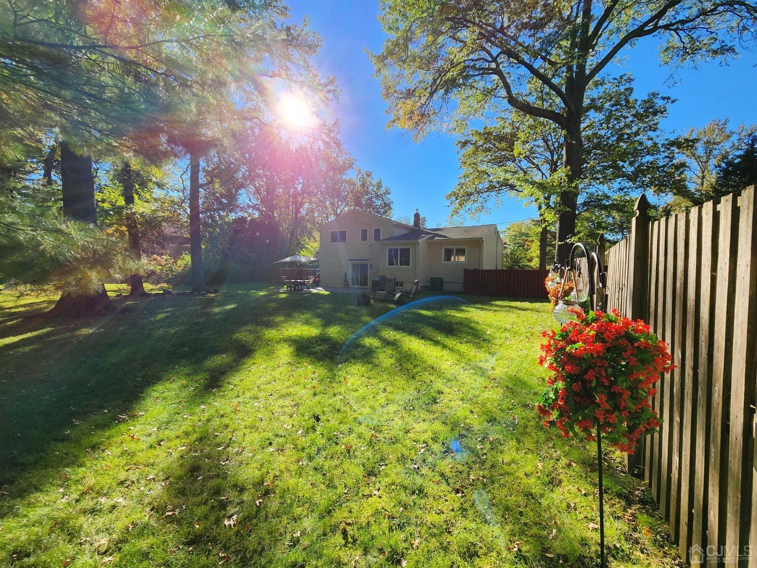 12 Warwick Road Edison, NJ 08820 - Photo 34 of 40 a view of a house with a yard and tree s