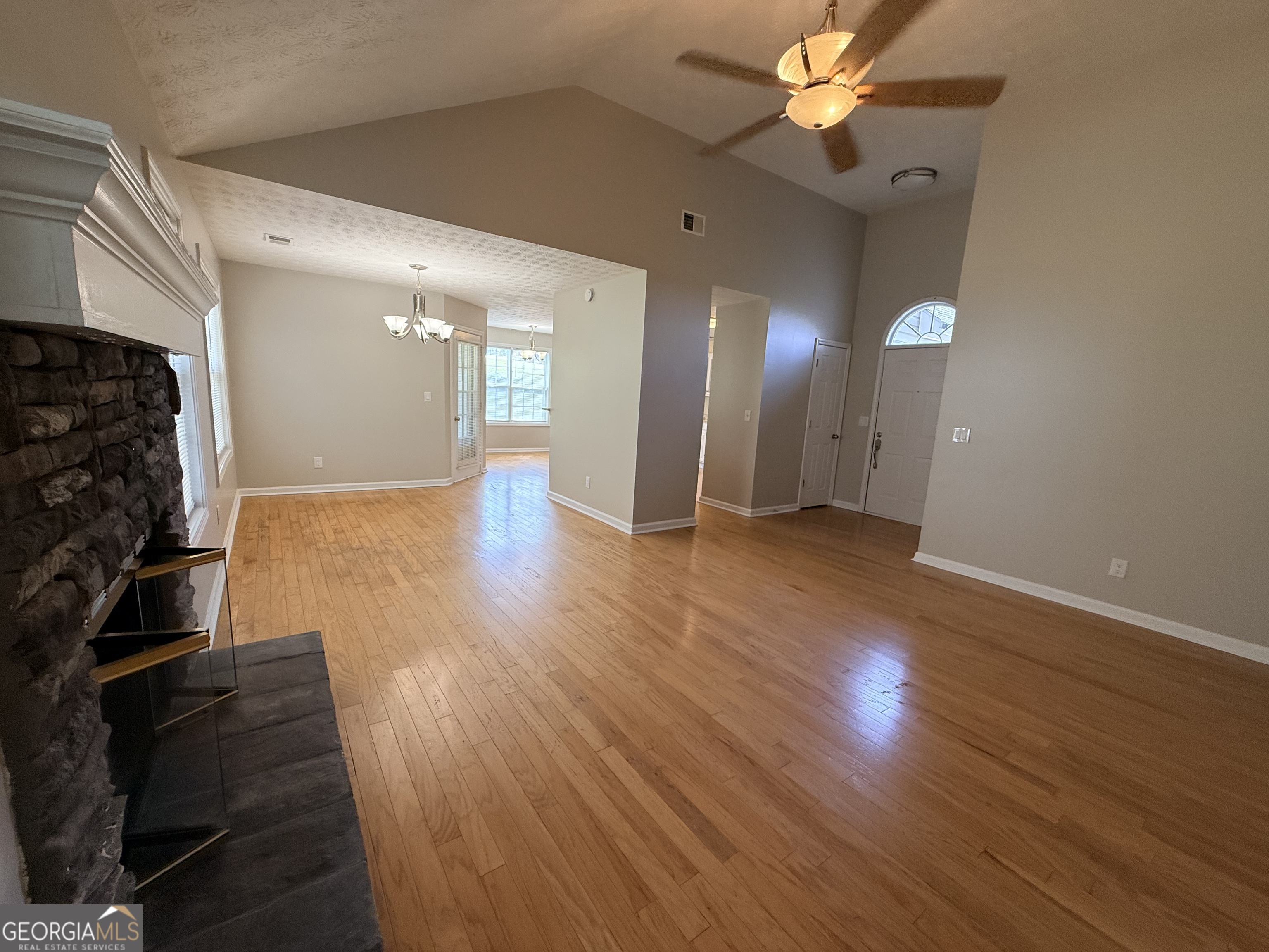 577 Pendergrass Road Winder, GA 30680 - Photo 9 of 25 a view of a livingroom with wooden floor