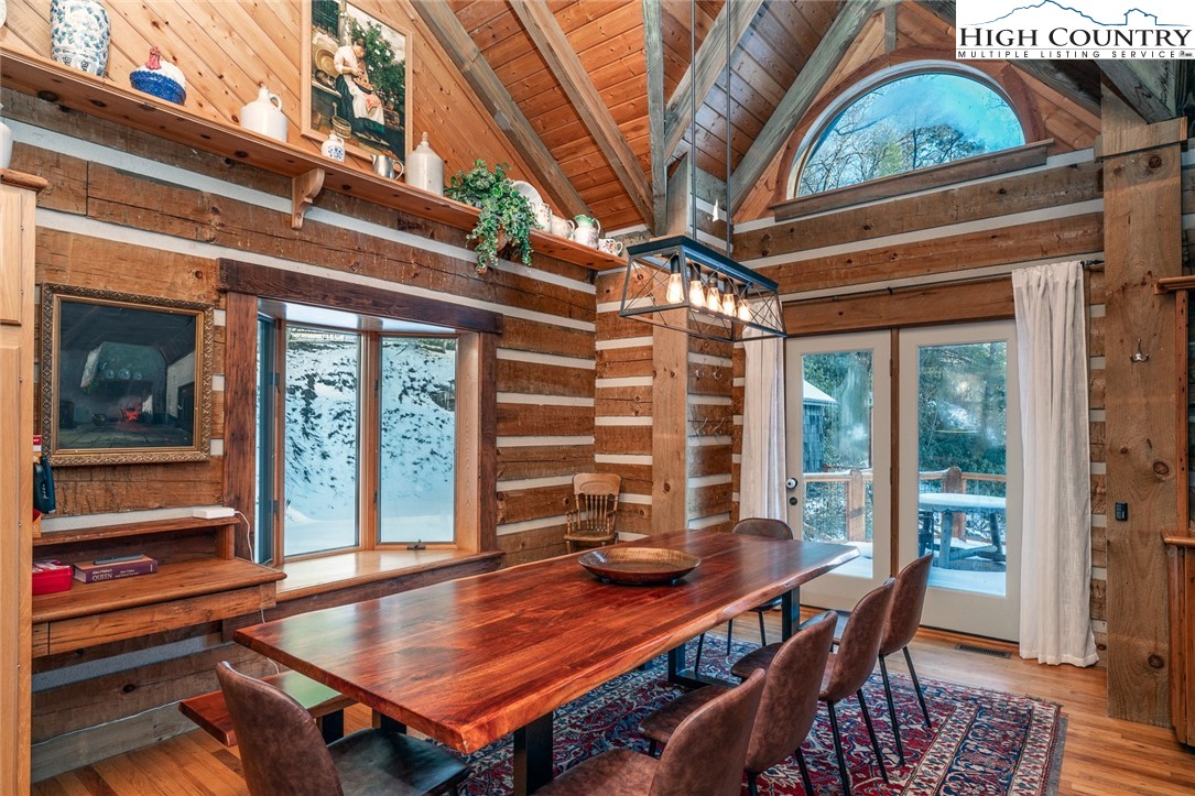 2560 Watauga River Road Sugar Grove, NC 28679 - Photo 15 of 50 a view of a dining room with furniture window and wooden floor