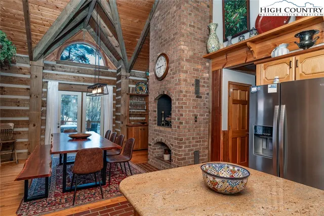 a view of a chairs and table in a patio