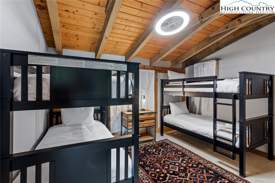 2560 Watauga River Road Sugar Grove, NC 28679 - Photo 23 of 50 a bedroom with furniture and a window