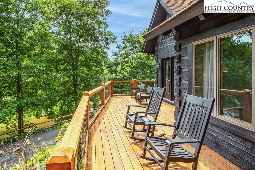 2560 Watauga River Road Sugar Grove, NC 28679 - Photo 37 of 50 a view of deck with furniture and garden