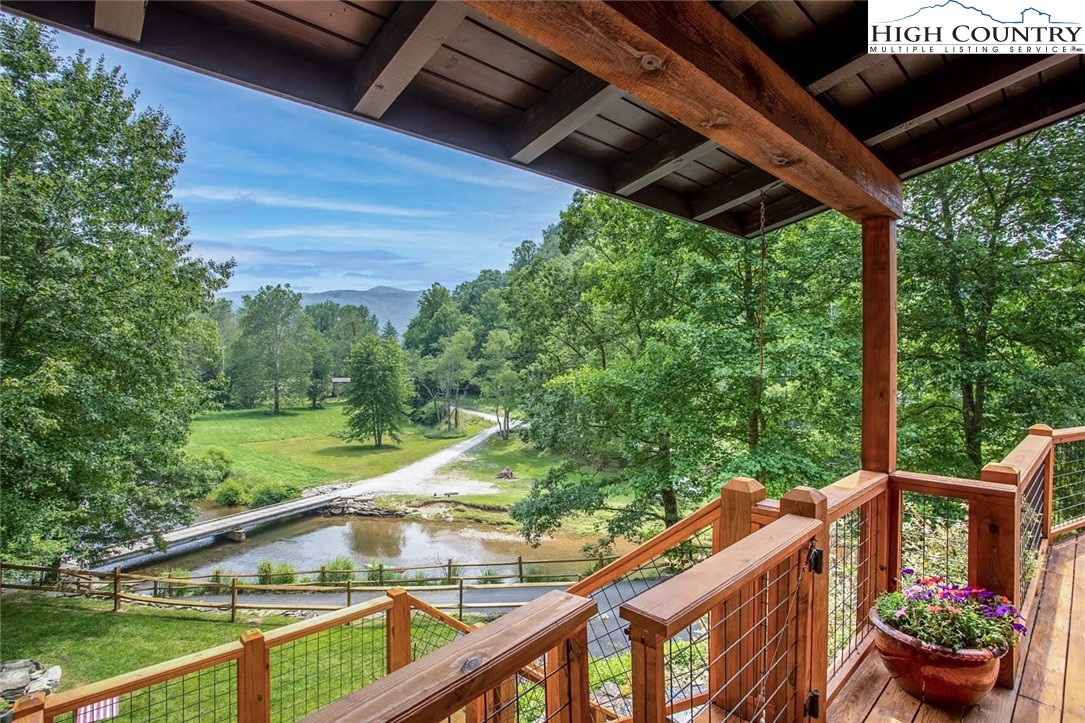 2560 Watauga River Road Sugar Grove, NC 28679 - Photo 7 of 50 a view of a two chair in the balcony