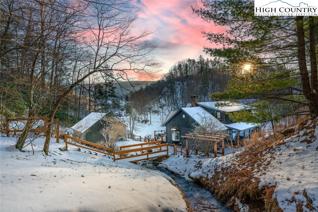 2560 Watauga River Road Sugar Grove, NC 28679 - Photo 10 of 50 an aerial view of a house with large trees
