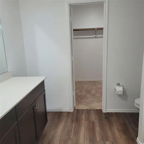 a bathroom with a sink and a toilet